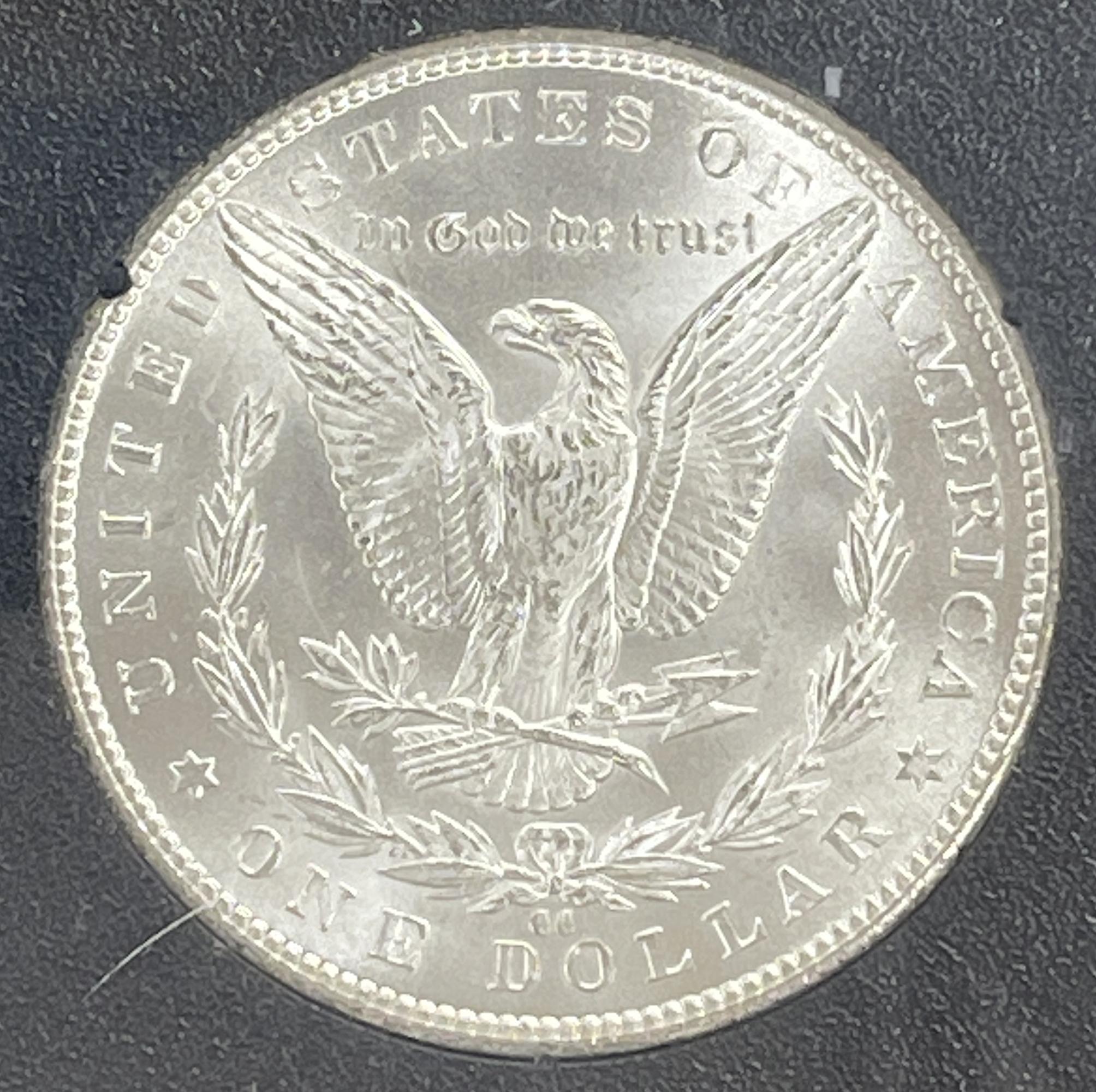 1884-CC Morgan Silver Dollar NGC MS 63 in GSA Hoard Holder